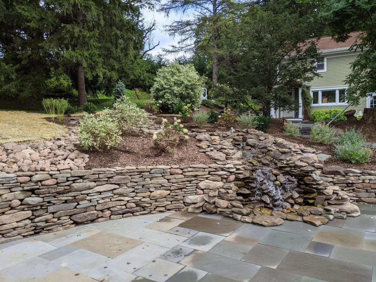 Natural stone landscape and retaining wall